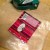Taping the smaller wrapper to the wax paper with clear tape. Taping the smaller wrapper to the wax paper with clear tape.
