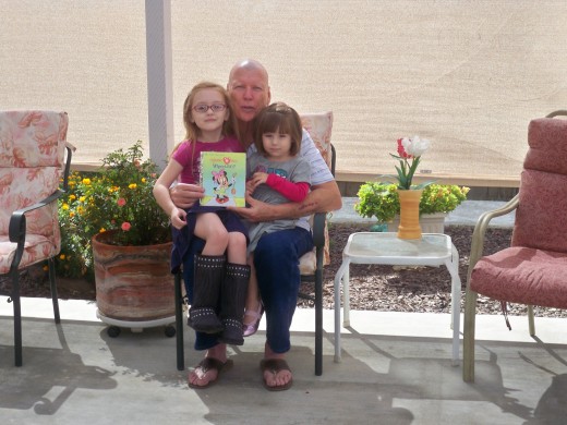 Grandpa, great granddaughters Mady and Ava