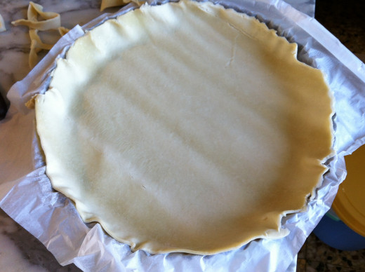 Bought pie crust with its paper on in the 9" tart pan