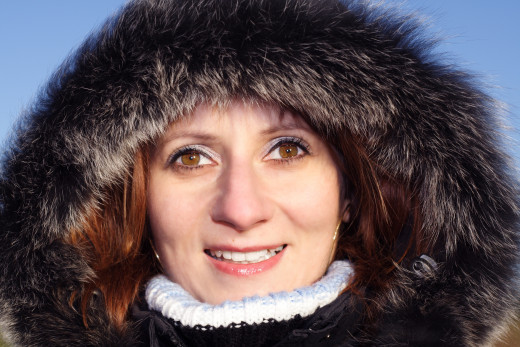 Winter Woman by Calimero Portrait of woman in winter hooded coat