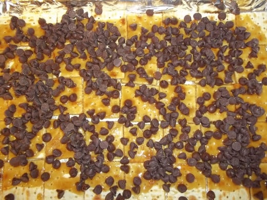 Sprinkling chocolate chips on top.