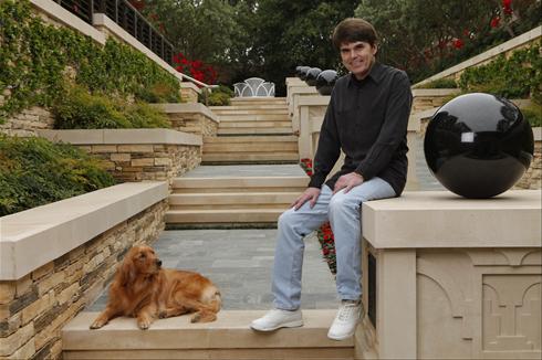Dean Koontz, his dog and his new house in 2009. 