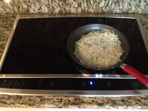 You must use pans that are designed to be used for induction cooking or have a stainless steel bottom, like Caphalon. I found this pan at TJ Maxx and I love it because it is teflon inside and perfect for making scramble eggs.