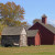 Close up of corn-cribs and barn. 