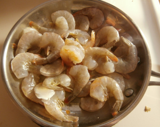 Add shrimp to heated oil.