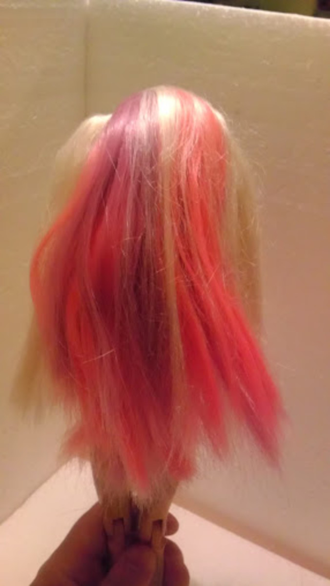 Terribly unattractive pink and purple Barbie hair...
