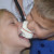 Children enjoying a marshmallow eating contest Children enjoying a marshmallow eating contest