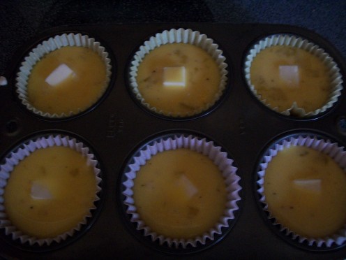 Scrambled egg gets poured over each one.