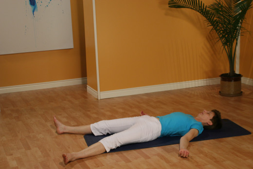 Lie on your back in Svasana, legs apart, feet apart, arms apart from your body with palms facing up to relax your shoulders, close your eyes and breathe.