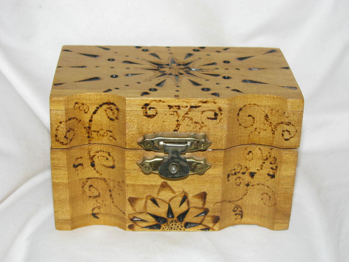 A wood burned box is a nice gift for those with jewelry.