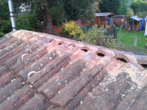 Photo shows cement removed from the roof and any dust swept off the roof. The roof is now prepared and ready for re-cementing.
