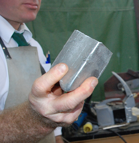 Aluminium like other metals have a particular heat capacity. Some metals are better 'holders of heat' than others. We can measure  specific heat capacity, and can also use the concept to identify unknown metals.