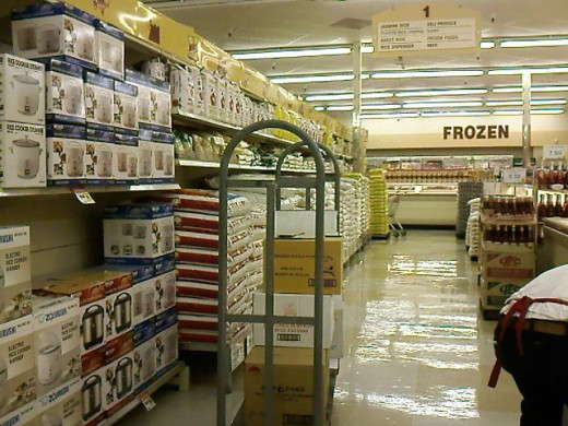 Look at all those rice cookers and sacks of rice.