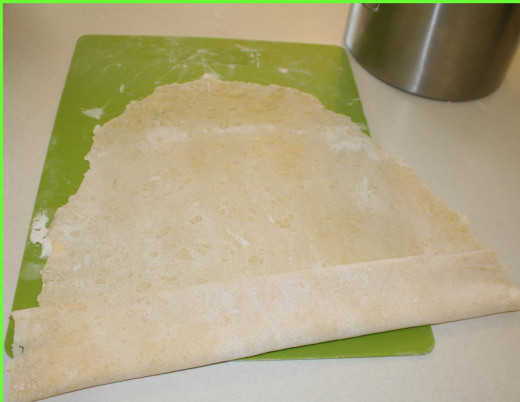Preparing to cut the noodles