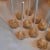 Cake pops with sticks inserted, ready to freeze
