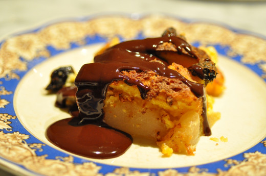 Brioche, Pear and Prune Pudding with Chocolate Sauce Image: © Siu Ling Hui