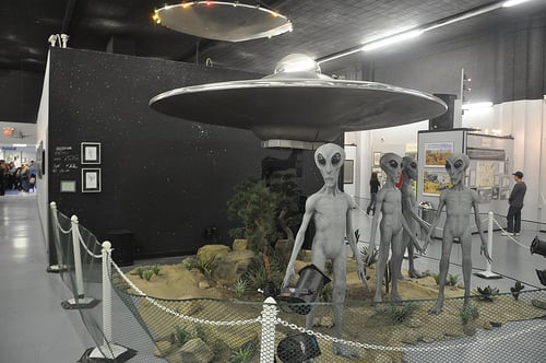 Thus is one of hundreds of exhibits and displays -- A reproduction of the original crash landing in Roswell, including one spacecraft disc and four aliens.