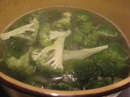 Cook broccoli in broth.