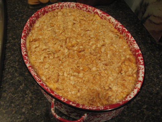 Top with cracker crumbs and bake.