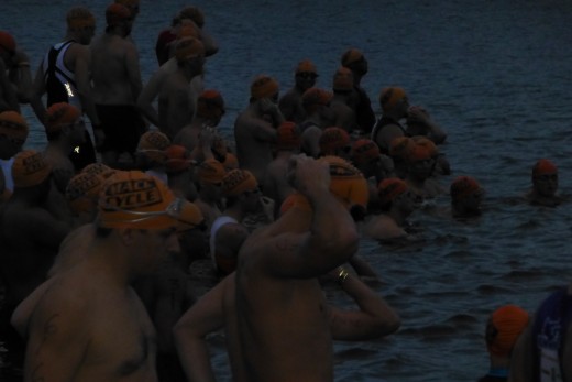 Here I accidentally turned the flash on which made the distant swimmers too dark in the early dawn light.