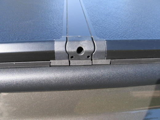 This is a closeup shot of the Solid Fold cover, the Rugged Cover would be similar. Notice that it doesn't sit flush under the bed rails, just for looks, but this simple design is the easiest overall to deal with.