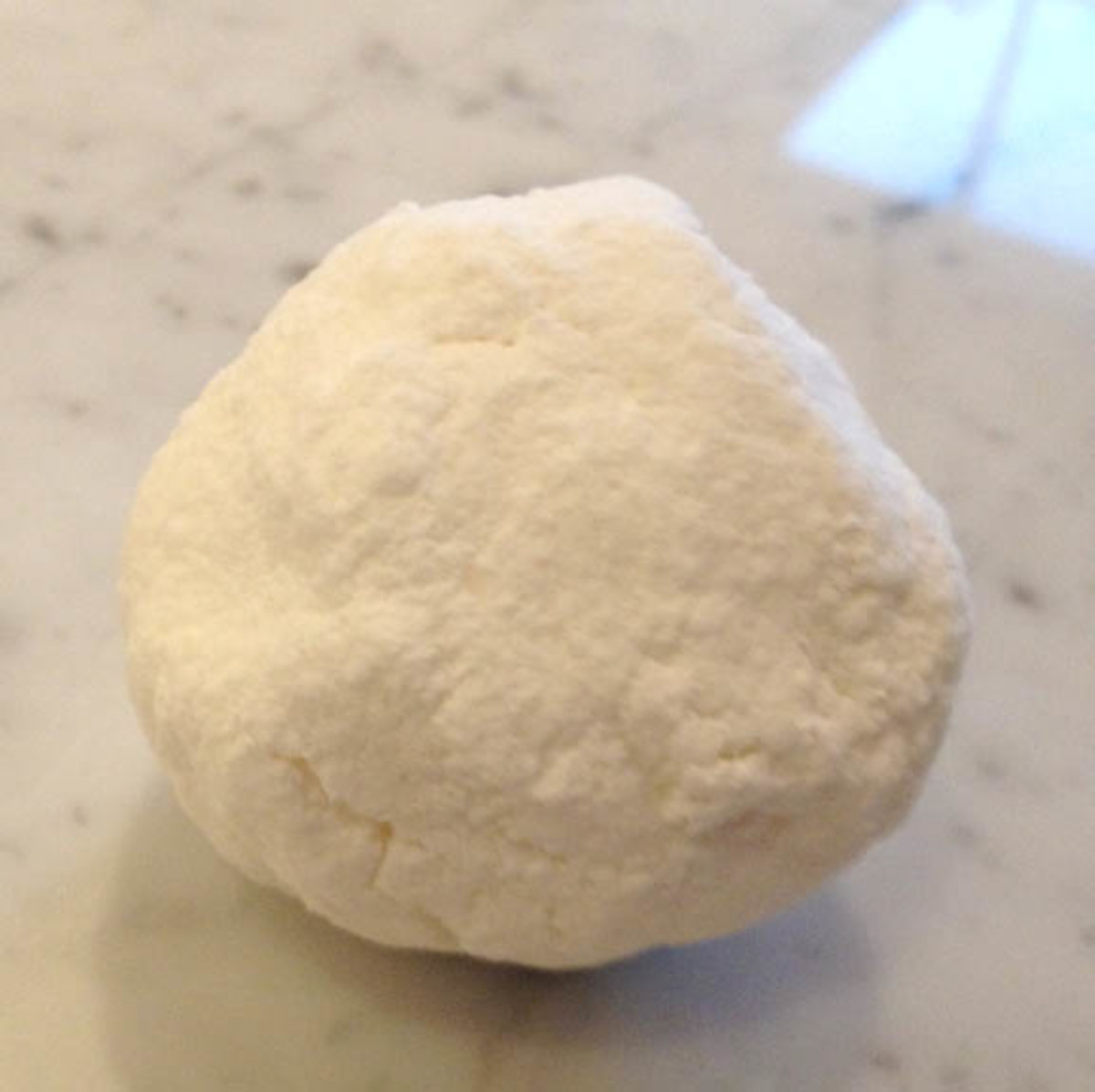 Here is one of the bath balls I made. Simply shape a ball from the powder once you have misted it.