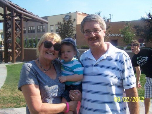Mom, Dad and Ethan..and youngest brother Bryan in the background.