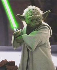 In this version, Yoda definitely does not use a lightsaber. More importantly though, he is the one that first spots the anger and hatred dwelling within Anakin.
