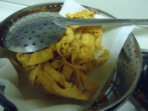 Put it on a paper napkin to drain excess oil