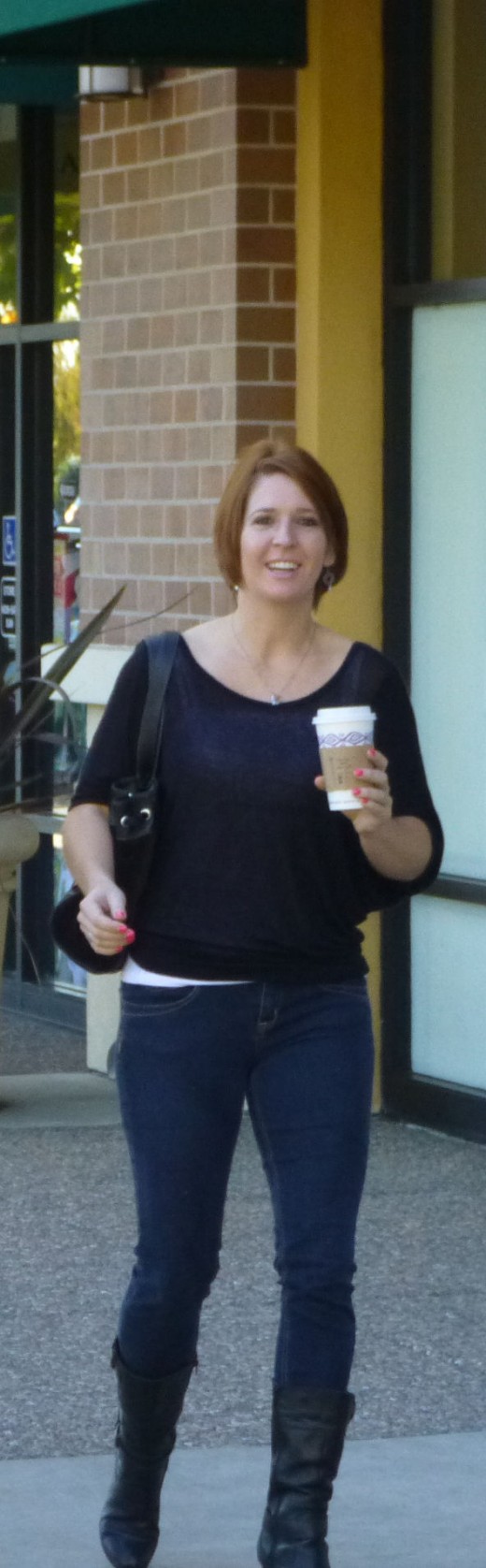 Kristen with coffee in hand! Gary doesn't drink coffee.
