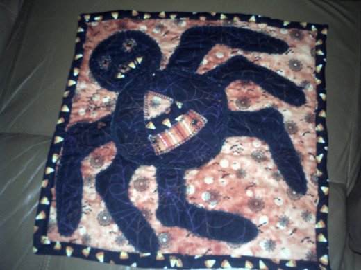 The Opposite side Uses the alternate material and the edges are just strips of a third fabric that would offset everything to use for the edging.