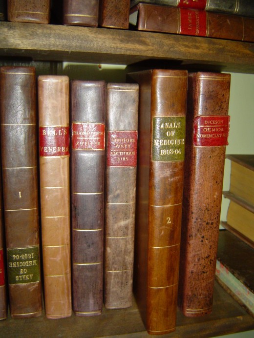 A wall of antique books, probably worth quite a bit!