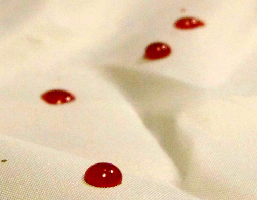 Blood drops on cloth.