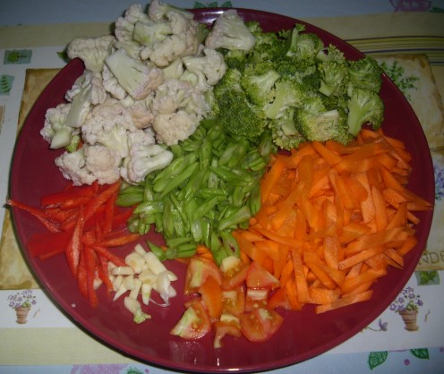 Some of the ingredients: Garlic, tomatoes, peppers, string beans, carrots, broccoli and cauliflower.