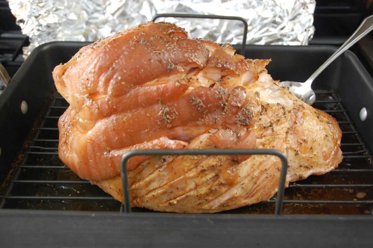 Baste the ham about every half hour or so, cover with aluminum foil