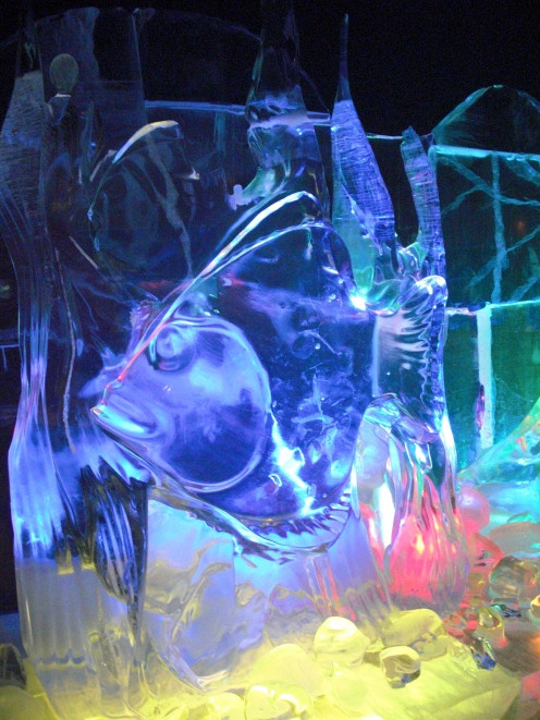 Colored lights illuminate ice sculptures inside the Fairbanks Ice Museum