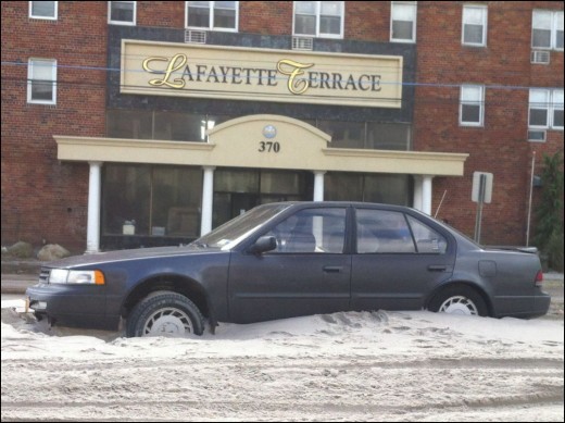 Cars on Long Beach stuck in sand.