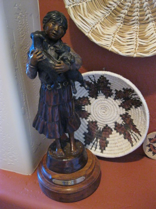 Small bronze by Susan Kliewer cowgirl artist who has won a number of awards at the Cowgirl Up shows.