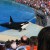 The One Ocean show allows guests to view orcas as they swim and perform tricks. The One Ocean show allows guests to view orcas as they swim and perform tricks.