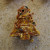 Remove the bird feeder from the cookie cutters and tie a piece of twine through the hole. Remove the bird feeder from the cookie cutters and tie a piece of twine through the hole.