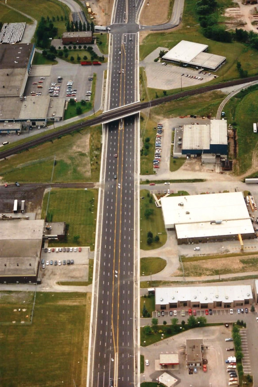 Walker's Line from North Service Rd. (at top of picture) and going northerly under the newly constructed railway underpass (towards Mainway which is just out of the picture at bottom) July 1, 1987.