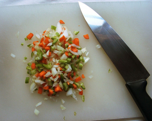 Diced onions, celery and carrot called mirepoix usually in 2:1:1 ratio (onions twice as many).