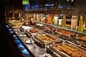 Buffett style eating is not always mindful, especially when the restaurant is busy. Patrons often rush through and gorge.
