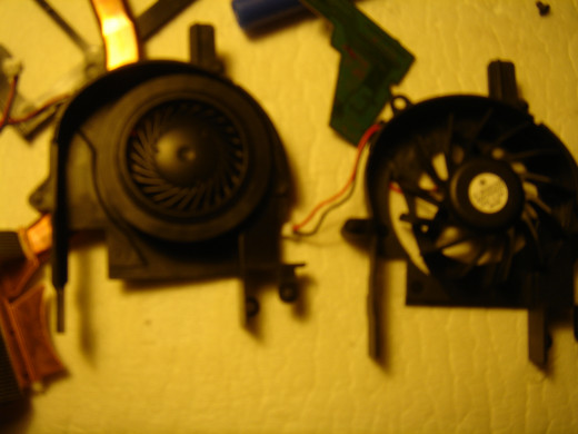 A new laptop fan (right) replacing the one with noise (left).