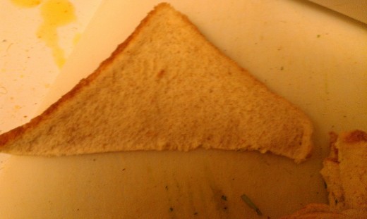 Bread sliced diagnolly into half