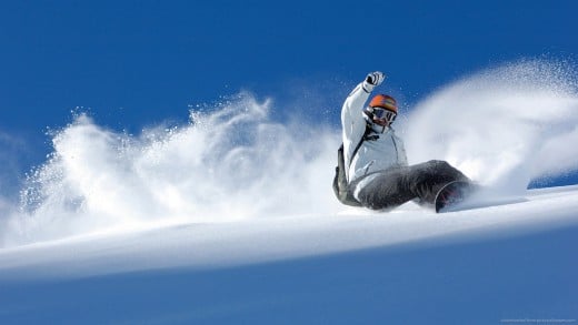 snowboarding in powder