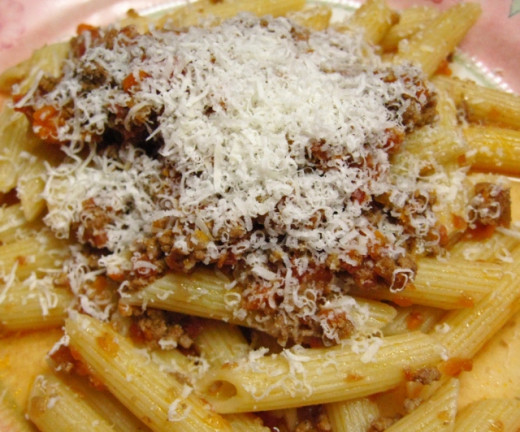 Penne with meat sauce and Parmesan cheese