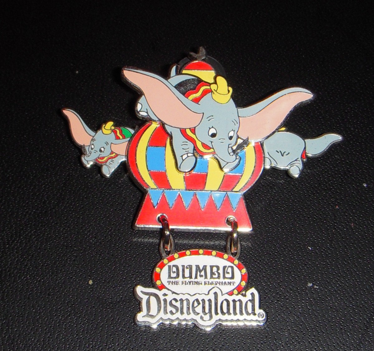 Unusual Dumbo pin features both moving Dumbos (sides) and a dangle.