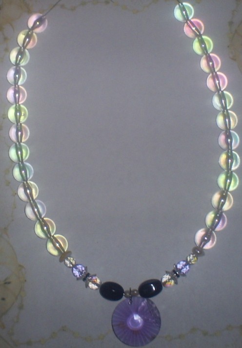 This is what the necklace looks like when almost all the acrylic beads have been added. This is what the necklace looks like when almost all the acrylic beads have been added.
