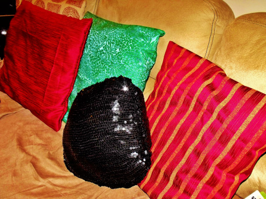 My handmade pillows.  Sequence pillow made from sequenced Halloween pants outfit.